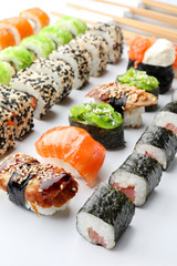 Tasty sushi on white background