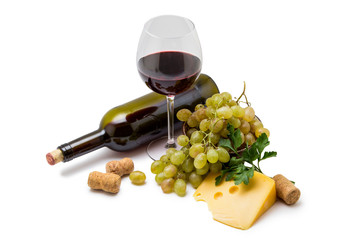 Bottle of wine cheese and grapes