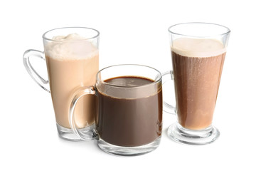Glass cups with tasty aromatic coffee on white background