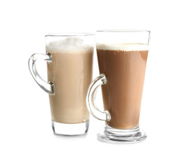 Glass cups with tasty aromatic coffee on white background