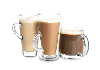 Glass cups with tasty aromatic coffee on white background
