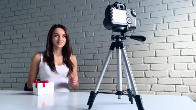 Backstage. Beautiful woman talk to camera for making vlog
