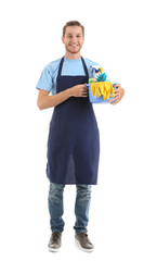 Man with cleaning supplies on white background