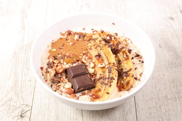 porridge with banana, nuts and chocolate