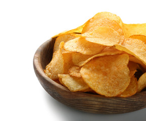 Bowl with tasty potato chips on white background