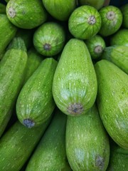 stack of green Zucchini (courgette), as texture/background