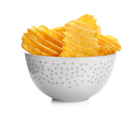 Bowl with tasty potato chips on white background