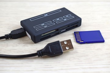 Card reader and flash drive.A device for transferring information from a flash drive to a computer.