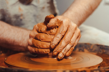Potter makes a jug