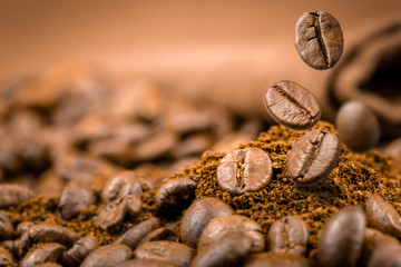Coffee beans falling on pile
