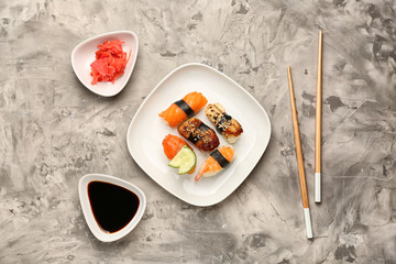 Composition with tasty sushi on table