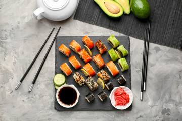 Composition with tasty sushi on table