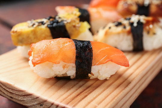 Tasty Sushi On Wooden Stand, Closeup