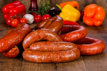 Pork sausages over wooden