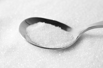 Spoon with sugar, closeup