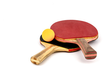 Yellow ball on pair of ping pong