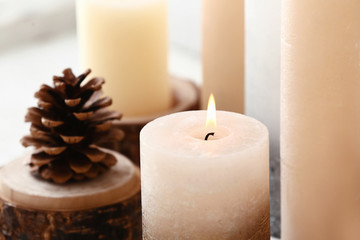 Beautiful burning candle, closeup