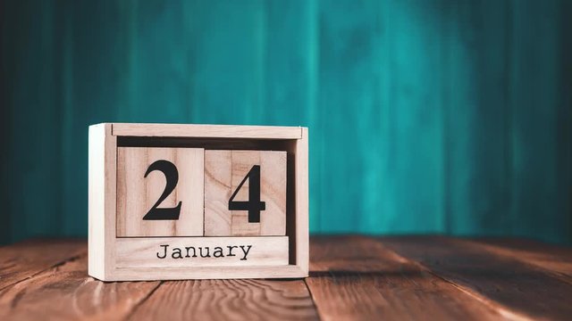Retro wooden calendar for the year with fast flipping cubes, 365 days, stop motion.