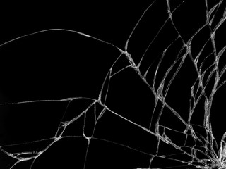 Cracked glass texture on black background. Isolated realistic cracked glass effect.