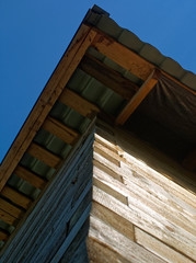 unfinished house from a bar in the summer