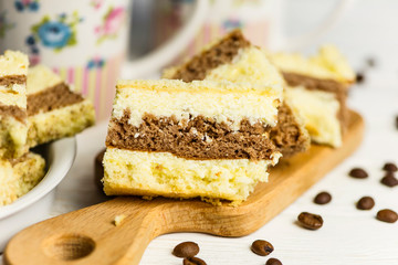 cake with coffee filling on a wooden board