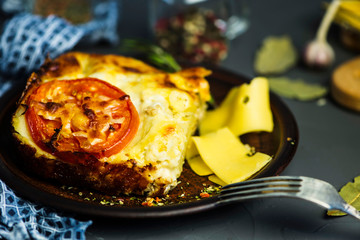 baked meat pie with cheese and tomato, lasagna