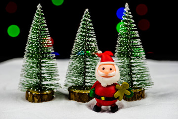 Santa Claus under the pine tree
