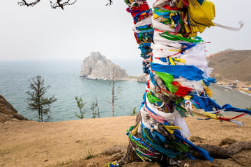 Colorful ribbons on the tree at Lake Baikal in Siberia