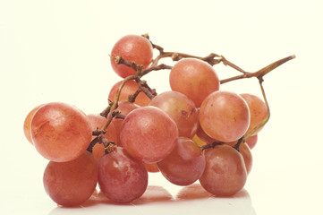 bunch of grapes isolated on light background