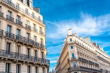 Paris, beautiful buildings boulevard Haussmann, typical parisian facades 