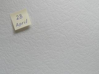 April 28, calendar date sticky note