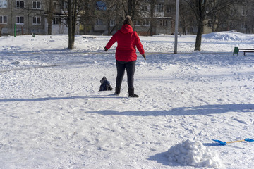 Children sledding in winter