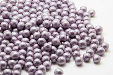 Multi-colored pearls on a white background