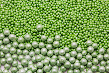 Multi-colored pearls on a white background