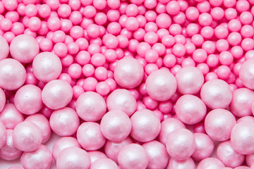 Multi-colored pearls on a white background