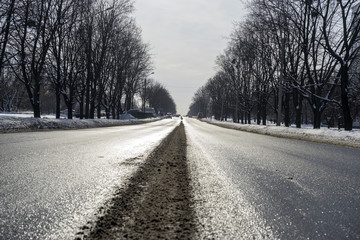 Fototapeta premium In winter the road is for cars