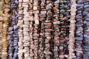 Stone colored necklaces.
