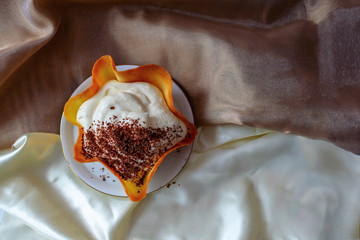 Waffle basket with mascarpone cream and chocolate chips. top view