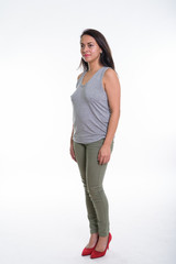 Full body shot of beautiful woman standing and thinking while lo