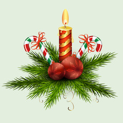 Christmas arrangement of fir green branches, balls, a burning candle and two staffs with red ribbons.