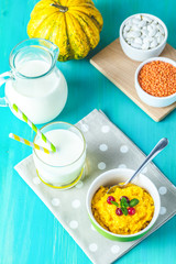 Delicious homemade pumpkin porridge with cranberry and mint