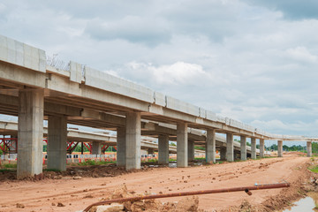 Fototapeta premium Parallel bridge way under contruction,countryside,long bridge,tollway,The road outside,Site construction of the bridge tollway large.