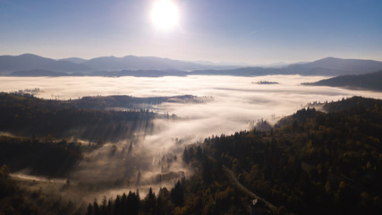 Majestic sunrise in the mountains landscape. Carpathian mountins with blue sky panoramic wiew, Ukraine.