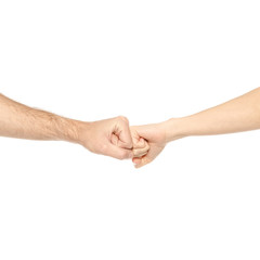 Two hands holding each other strongly fists on white background isolation