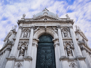 Fototapeta na wymiar VENICE, ITALY, NOV 1st 2018: Santa Maria della Salute or Saint Mary of Health Church or Basilica facade or exterior view. Perspective ground view.
