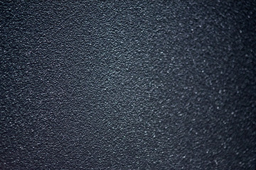 Textured surface of painted metal with powder coating. Fine texture metal surface