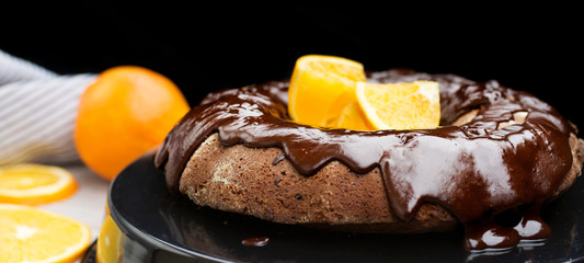 fresh baked delicious chocolate  cake with oranges