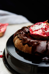 Homemade chocolate cake with pomegranate