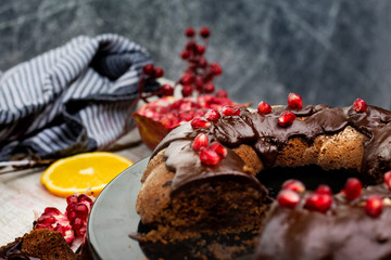 Cake with Chocolate Glaze and Pomegranate Seeds.