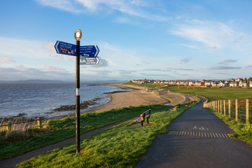 Direction sign at Knowlys Road, Heysham, on the Morecambe Bay Coast, looking towards Sandylands and Morecambe